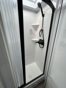 there's now a sliding fabric shower door that looks and feels more premium